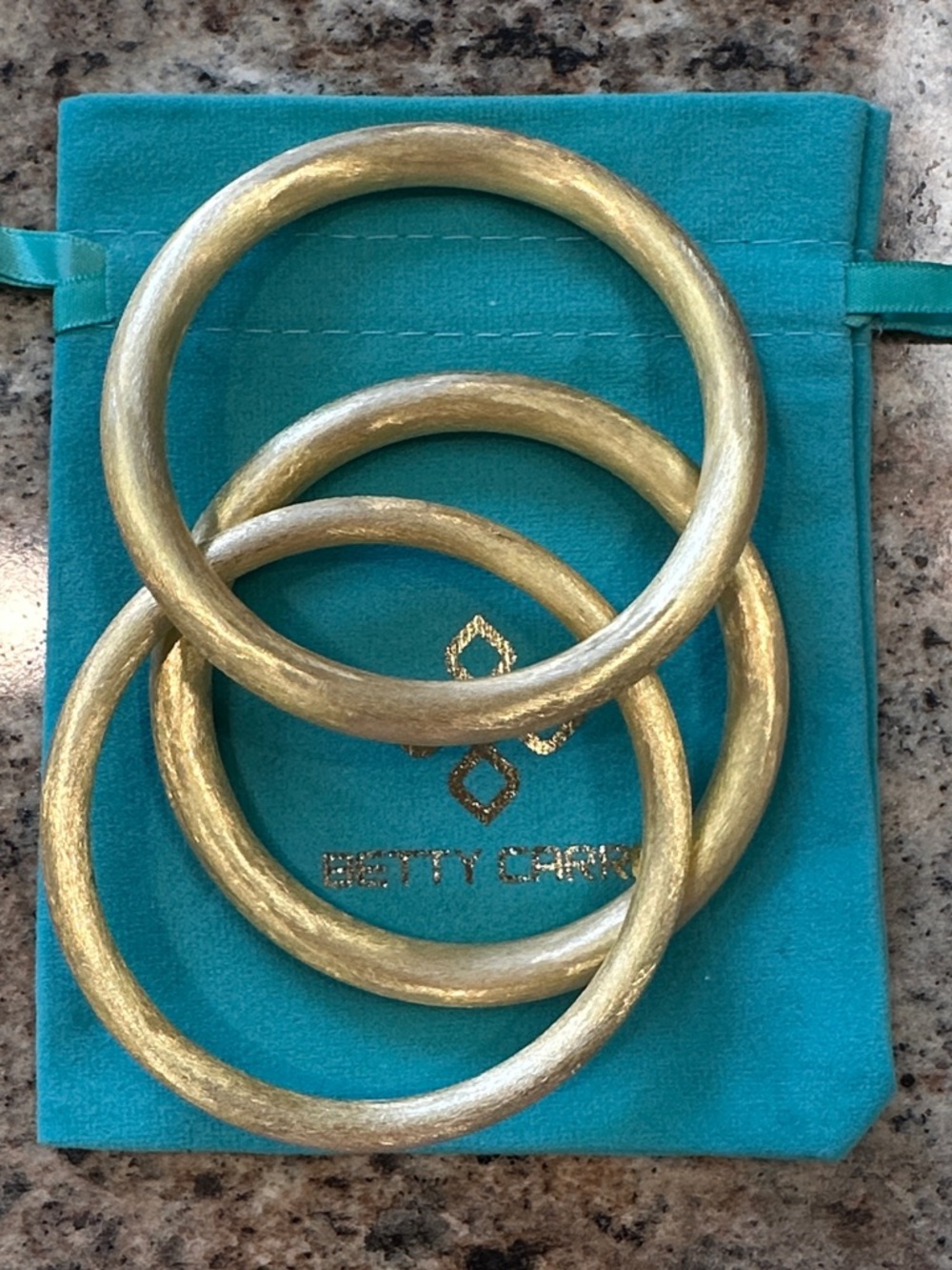 New in package Oggi bangles Betty Carre Set of 3. Matte finish 18kt gold plated